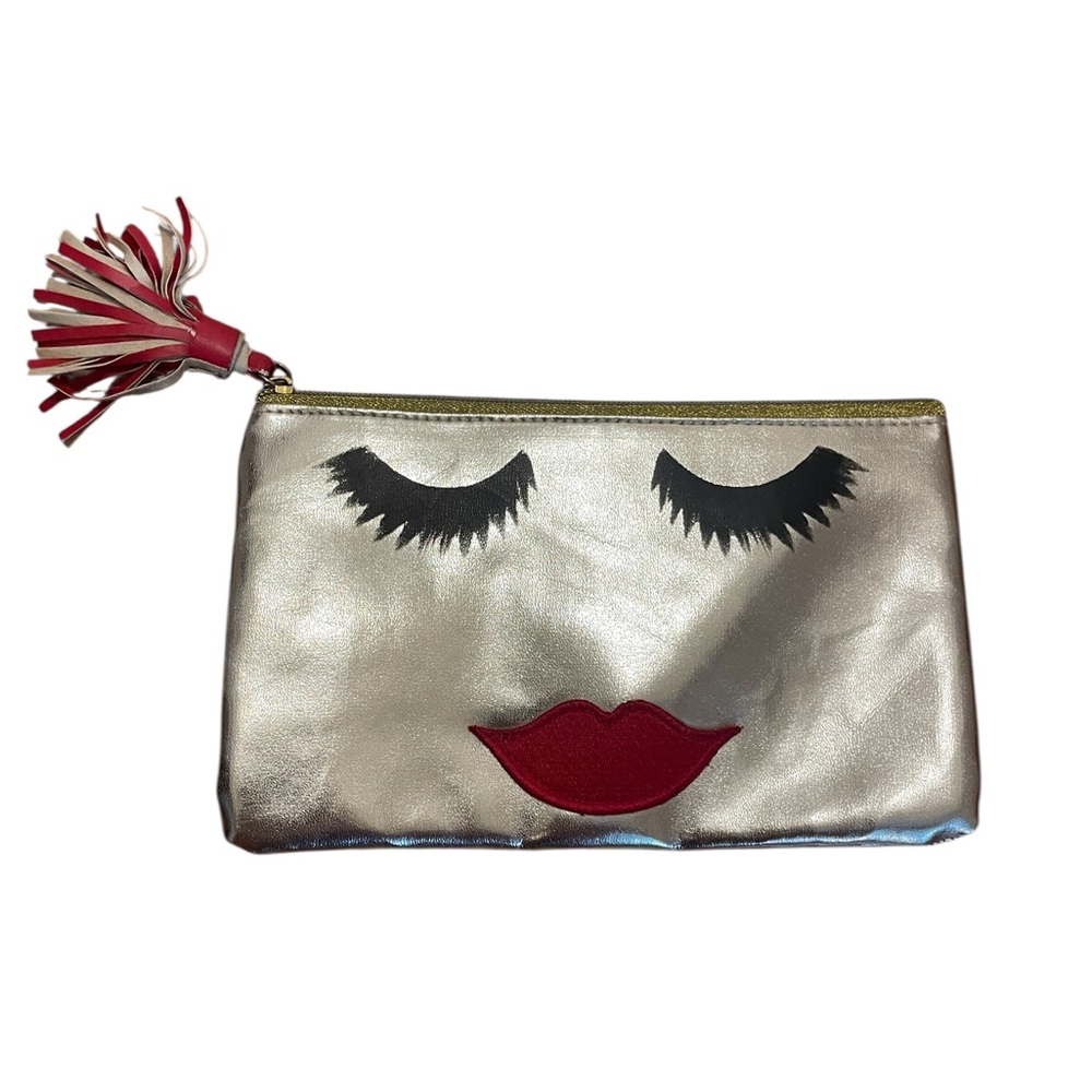 Emma Lomax London, flirty lashes gold clutch, cosmetics bag.